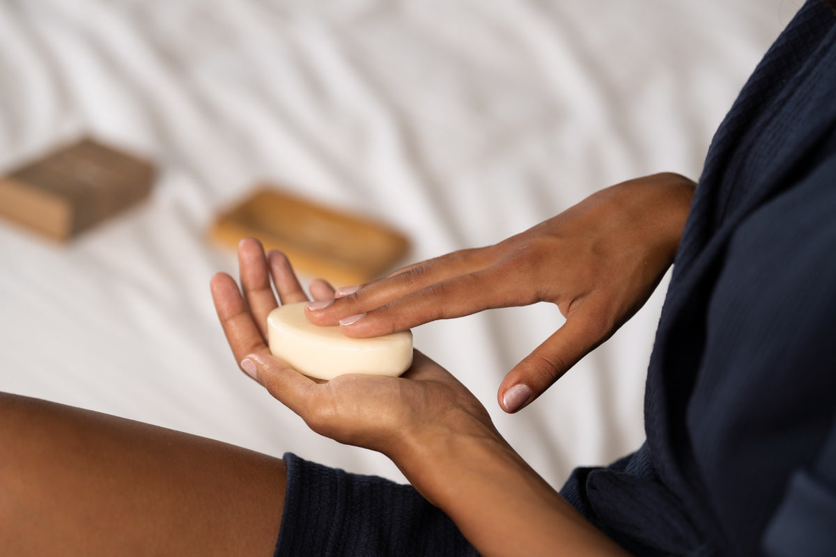 Hands touching plastic free body bar