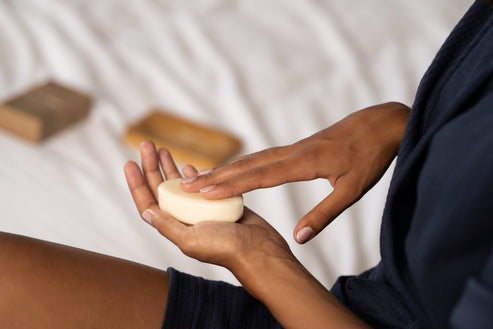 Hands touching plastic free body bar